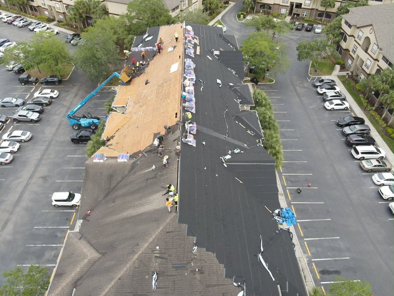 ROOSO crew installing a new shingle roof on a Tampa Bay townhome